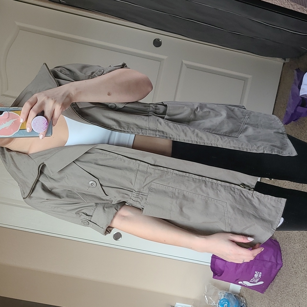 Utility jacket with a foldaway hoodie